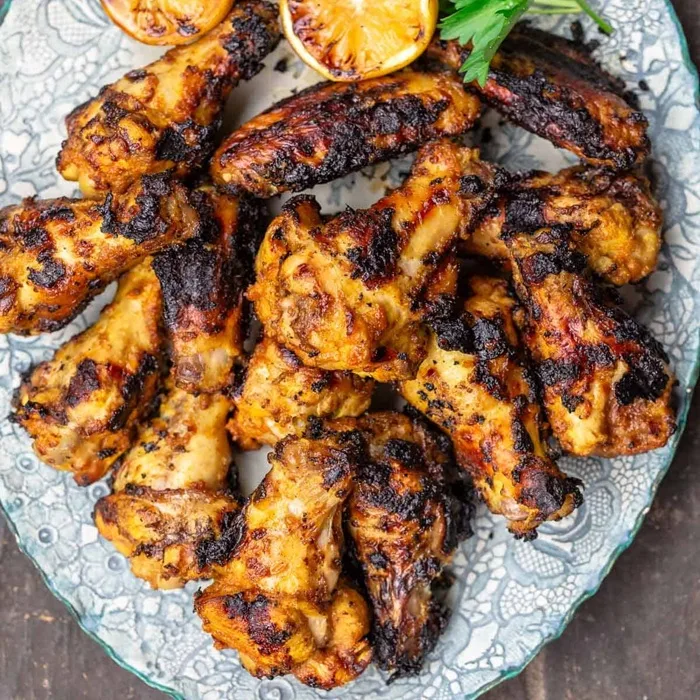 Куриные крылья с зирой, лимоном и чесноком